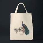 Elegant Peacock Bride Squad Tote Bag<br><div class="desc">This Elegant Peacock Bride Squad Tote Bag features a hand-drawn blue and teal peacock perched on Magnolia branches in full bloom in black ink and the title "Bride Squad". Personalise with your city and date by clicking on "Personalise this template" on the product page.</div>