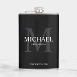 Elegant Personalised Groomsmen Monogram and Name Hip Flask<br><div class="desc">Add a personal touch to your wedding with personalised groomsmen flask.
This flask features personalised groomsman's name with title and wedding date in white and monogram in light grey as background,  in classic serif font style,  on black background.

Also perfect for best man,  father of the bride and more.</div>