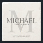 Elegant Personalised Groomsmen Stone Coaster<br><div class="desc">Add a personal touch to your wedding with personalised groomsmen stone coaster.
This coaster features personalised groomsman's name with title and wedding date in grey and monogram in light grey as background,  in classic serif font style.

Also perfect for best man,  father of the bride,  ring bearer and more.</div>