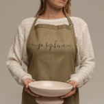 Elegant personalised script name standard apron<br><div class="desc">Hosting a botanical, succulent workshop? How about a cooking class? Give out personalised aprons for your guests with an elegant font script type that will surely delight them. Have the talking about this sophisticated giveaway. Tip: to keep the long swashes at the end keep the small squares at the end...</div>