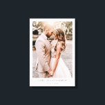 Elegant Photo Wedding Keepsake Canvas Print<br><div class="desc">Make this simple modern minimalist canvas wall art piece your first wedding keepsake to enjoy over the years, and to mark the beginning of your married life together from day one. Replace the sample photo with your favorite wedding photo, and personalize with your names and wedding date. Turn your cherished...</div>