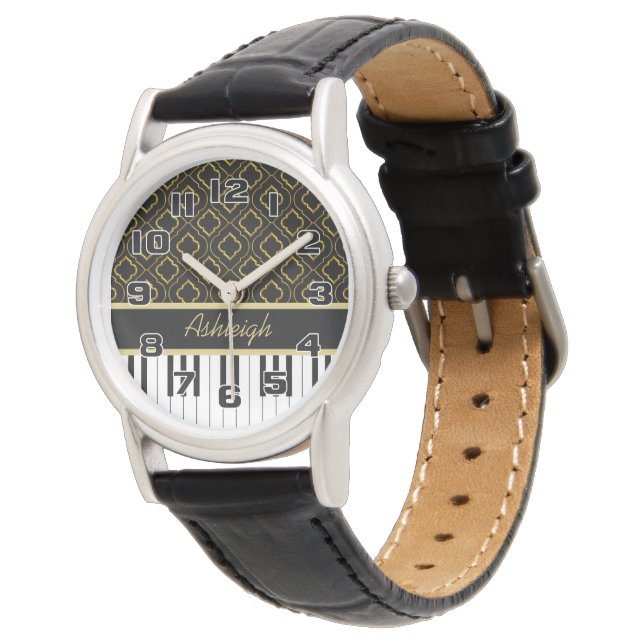 Elegant Piano Keys with Gold Quatrefoil on Black Watch (Angled)