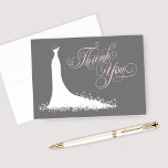 Elegant Pink Charcoal Wedding Gown Bridal Shower Thank You Card<br><div class="desc">Elegant bridal shower or wedding "Thank You" note cards for the stylish bride-to-be features an ornate calligraphy script font and flowing wedding gown. Scroll flourish, flower and butterfly details accent the ethereal dress. Folded card format includes space on the inside for a handwritten message. Design colors include colors include white,...</div>