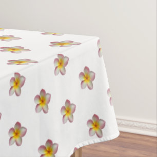 Elegant Pink Plumeria Flowers on White Tablecloth