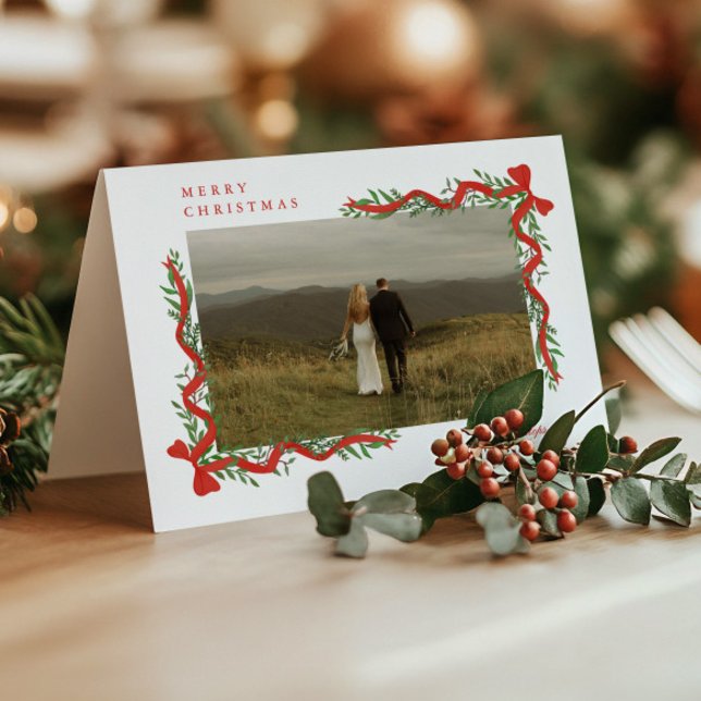 Elegant Red Bow with Greenery Photo Christmas Holiday Card (Elegant red ribbons with bows and greenery photo christmas holiday cards. )