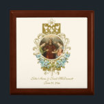 Elegant Religious Catholic Mary Joseph Wedding Gift Box<br><div class="desc">This is a beautiful traditional Catholic religious mage of the Blessed Virgin Mary and St. Joseph on their wedding day inlaid in a vintage golden floral frame. The inside has an elegant gold crucifix with wedding rings overlaid on blue forget-me-nots. All text and fonts may be modified to suit the...</div>