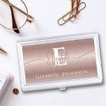 Elegant Rose Gold Brushed Metal Girly Monogrammed Business Card Holder<br><div class="desc">Elevate your professional image with our Elegant Rose Gold Brushed Metal Girly Monogrammed Business Card Case! Make a lasting impression with a touch of sophistication including your monogram elegantly displayed in white on a rose gold brushed metal case. The bottom text quote adds an extra layer of inspiration. Showcase your...</div>
