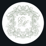 Elegant Sage Green Vintage Monogram Crest Wedding Classic Round Sticker<br><div class="desc">These elegant sage green classic wedding monogram stickers feature an ornate vintage style monogram crest with fancy script calligraphy for the initials of the bride and groom. Find matching products in the collection,  or message me through Zazzle Chat for more products and design tweaks.</div>