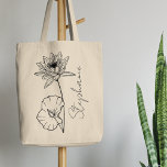 Elegant Script Name Lotus July Birth Month Flower Tote Bag<br><div class="desc">Elegant,  minimalist and modern black hand drawn water lily or lotus flower,  July birth month flower with customisable name in elegant script,  personalised gift for any occasion,  including Birthdays,  gifts for bridesmaids,  best friends,  Christmas,  and more.</div>