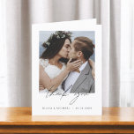 Elegant Script Photo Wedding Thank You Card<br><div class="desc">Express your heartfelt gratitude in timeless style with this Elegant Script Photo Wedding Thank You Card. Featuring refined calligraphy, a full photo layout, and minimalistic design elements, this card is the perfect way to thank your guests while showcasing a cherished moment from your big day. Ideal for modern, romantic, or...</div>