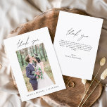 Elegant Script Photo Wedding Thank You Card<br><div class="desc">Express your heartfelt gratitude in timeless style with this Elegant Script Photo Wedding Thank You Card. Featuring refined calligraphy, a full photo layout, and minimalistic design elements, this card is the perfect way to thank your guests while showcasing a cherished moment from your big day. Ideal for modern, romantic, or...</div>