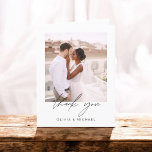 Elegant Script Photo Wedding Thank You Card<br><div class="desc">Express your heartfelt gratitude in timeless style with this Elegant Script Photo Wedding Thank You Card. Featuring refined calligraphy, a full photo layout, and minimalistic design elements, this card is the perfect way to thank your guests while showcasing a cherished moment from your big day. Ideal for modern, romantic, or...</div>