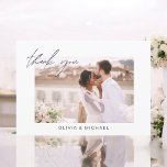 Elegant Script Photo Wedding Thank You Card<br><div class="desc">Express your heartfelt gratitude in timeless style with this Elegant Script Photo Wedding Thank You Card. Featuring refined calligraphy, a full photo layout, and minimalistic design elements, this card is the perfect way to thank your guests while showcasing a cherished moment from your big day. Ideal for modern, romantic, or...</div>