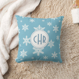 Elegant Snowflakes in Sky Blue Background Cushion