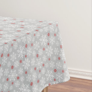 Elegant snowflakes white and red on grey tablecloth