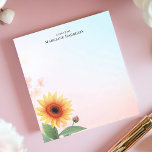 Elegant Sunflower Personalised Notepad<br><div class="desc">Capture the warmth of a sunny day with this elegant, personalised notepad. A beautifully detailed sunflower illustration graces the lower left corner, set against a soft, pastel gradient background. This design features space for your custom text, perfect for adding a personal touch. Ideal for quick notes, to-do lists, or heartfelt...</div>