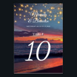 Elegant Sunset Beach String Light Summer Wedding Table Number<br><div class="desc">Elegant Sunset Beach String Light Summer Wedding Table Number. This design features a beautiful sunset with string lights and their unique details. Change the table numbers and order as many as you need.</div>