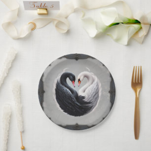 Elegant swans forning a heart together. paper plate