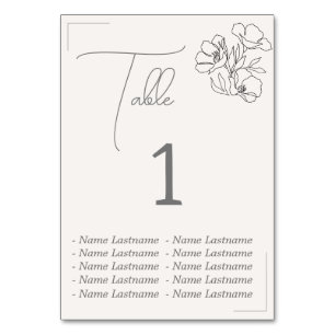 Elegant Table number with names, sitting.