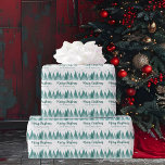 Elegant Teal Green Forest Custom Merry Christmas Wrapping Paper<br><div class="desc">An elegant row of winter fir trees and snowflakes above your personalised Merry Christmas script and your family last name in beautiful teal green below the snow filled forest. A modern holiday design with your custom message on lovely,  festive wrapping paper.</div>