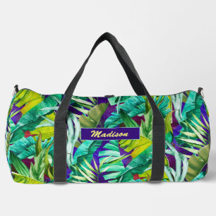 Elegant tropical green leaves purple printed duffle bag