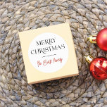 Elegant Typography Merry Christmas & Family Name Classic Round Sticker<br><div class="desc">An elegant Christmas sticker with 'Merry Christmas' in classic serif typography and your name in red script lettering. There is a sleek horizontal line divider separating the two sections of text. Ideal for sealing envelopes, decorating gift boxes, or embellishing festive items! Made to match our Merry Moments | Modern Christmas...</div>