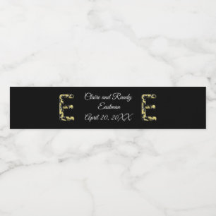 Elegant Wedding Black and Gold Letter E Monogram Water Bottle Label