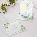 Elegant Wedding Bride & Groom Floral Roses White Glass Coaster<br><div class="desc">Chic and elegant, this romantic wedding keepsake design features romantic white vanilla wedding roses with hints of blush pink of displayed in leafy greenery on a classic white background. A trendy golden colour square frame provides a sparkling touch. Personalise wedding details with your names and wedding date in elegant and...</div>