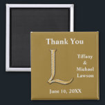 Elegant Wedding Gold Silver Letter L Monogram Magnet<br><div class="desc">This magnet is an elegant thank you gift for your bridal party or a unique wedding favour for your guests. The bride and groom's monogram is sophisticated and is accompanied by the happy couple's names and wedding date. The background offers a deep gold solid colour to support your text. The...</div>