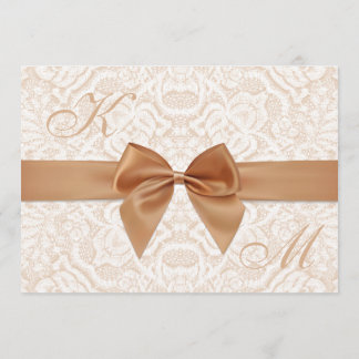 Elegant wedding invitation with ribbon and lace