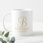 Elegant White and Gold Personalised Bridesmaid Coffee Mug<br><div class="desc">Elegant Personalised Bridesmaid Gifts featuring personalised monogram in gold elegant script font style with bridesmaid's name and title in gold classic serif font style. Also perfect for Maid of Honour, Flower Girl, Mother of the Bride and more. Please Note: The foil details are simulated in the artwork. No actual foil...</div>