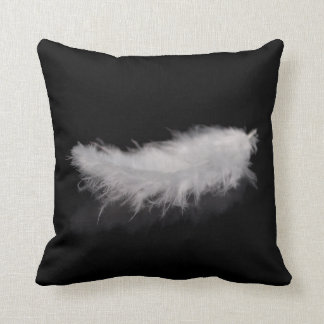 Elegant White Feather on a Black Background Cushion