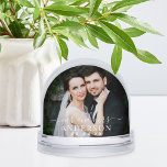Elegant White Script Mr and Mrs Photo Snowglobe<br><div class="desc">This romantic wedding snow globe features your photo with "Mr and Mrs" in flowing white calligraphy script and your last name and wedding date elegantly overlaid. The back displays a second photo for a beautiful two-sided keepsake. A heartfelt gift for newlyweds or a cherished memento to display year-round. All text...</div>