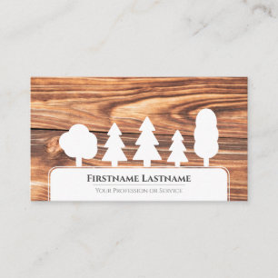 Elegant white trees on brown wood grain business card