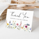 Elegant Wildflower Meadow Bridal Shower Thank You Card<br><div class="desc">Celebrate love and gratitude with our enchanting Elegant Wildflower Meadow bridal shower thank you card. Delicately crafted with vibrant hues of pink, yellow, purple, blue, and green, a lush array of wildflowers and foliage adorn the bottom, evoking the freshness of spring and the warmth of summer. "Thank You" is elegantly...</div>