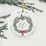 Elegant Winter Garland Wreath Monogram Crest Photo Ceramic Tree Decoration<br><div class="desc">Celebrate the joy of the holiday season with our winter garland wreath monogram crest Christmas photo ornament. Our personalised ornament features our winter garland wreath monogram crest design, year, and family signature. The reverse side features a photo and garland wreath frame. Spread the love and cheer this winter with these...</div>