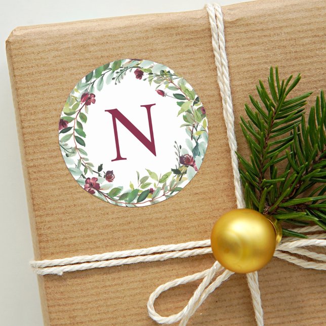 Elegant Winter Greenery Burgundy Monogram Wreath Classic Round Sticker (Creator Uploaded)