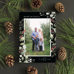 Elegant Winter Watercolor Greenery Botanical Photo Holiday Card<br><div class="desc">This elegant holiday photo card features a single vertical photo framed by beautiful watercolor eucalyptus, holly, and berries over a chic black background. The editable greeting on the front says "Happy Holidays". The back of the card is a coordinating foliage pattern, which can be removed if desired. You can also...</div>