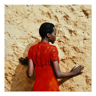 Elegant Woman in Red Dress Against Textured Rock Poster