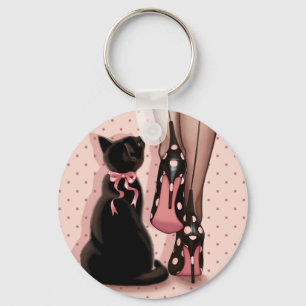 Elegant young woman and black cat key ring