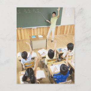 Elementary school students at school postcard