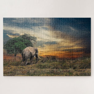 Elephant walking at sunset jigsaw puzzle