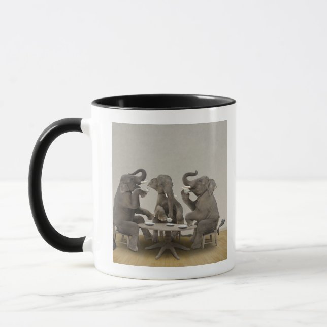 Elephants having tea party mug (Left)