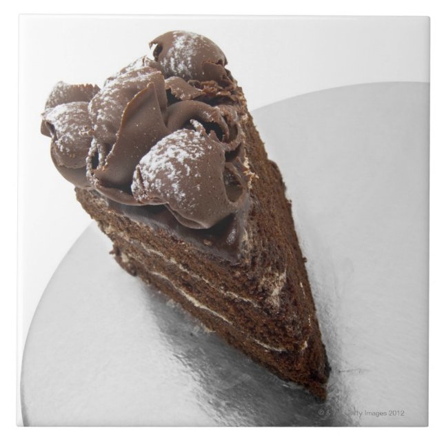 Elevated view of a piece of chocolate cake tile (Front)