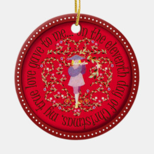 Eleven pipers piping ceramic tree decoration