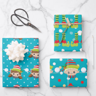 Elf boy girl faces feet on blue with snow pattern wrapping paper sheet