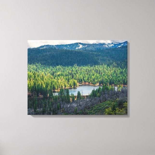 Emerald Basin Beneath Mountain Clouds Canvas Print (Front)
