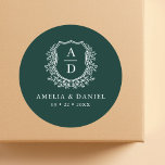 Emerald Green Crest Modern Monogram Wedding  Classic Round Sticker<br><div class="desc">Add a touch of luxury to your wedding with the Emerald Green Crest Modern Monogram Wedding Classic Round Sticker. Featuring a rich emerald green background, a refined crest design, and a personalised monogram, this sticker is perfect for enhancing your wedding invitations, favours, or decor. Its elegant and timeless style makes...</div>