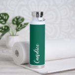 Emerald Green Personalised Wedding Bridesmaid Water Bottle<br><div class="desc">Gift your wedding bridesmaid or maid of honour with this trendy, vacuum Insulated water bottle that features her name in white, stylised script on an emerald green colour background designed to match your wedding colour scheme. Personalise bottle by editing and replacing name with your own as desired. Select your water...</div>