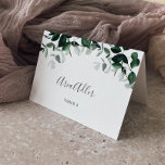 Emerald Greenery Guest Name Wedding Place Card<br><div class="desc">These emerald greenery guest name wedding place cards are perfect for a boho wedding. The elegant yet rustic design features moody dark green watercolor leaves and eucalyptus with a modern bohemian woodland feel. Personalise with the guest name and table number and add each one to your cart individually. Alternatively, leave...</div>